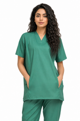 close front view of women’s scrub top with hands inside slash pockets