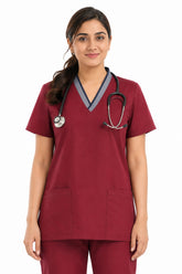 contrast V-neck scrub top with chest and front pockets close-up