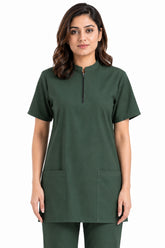 zippered scrub top neckline and front pockets close-up