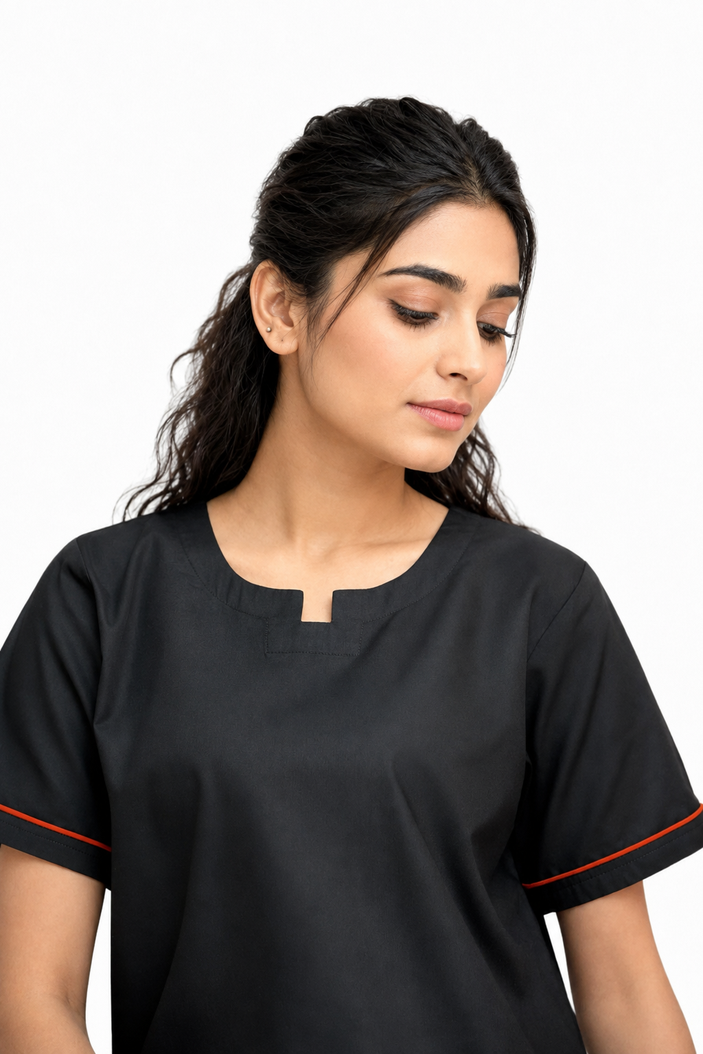 close-up of the notched round neckline and orange-trimmed short sleeves