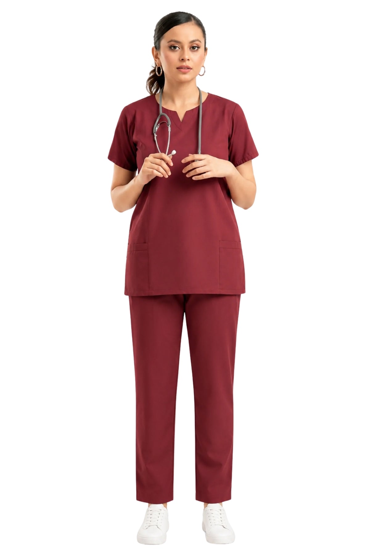 female healthcare professional in scrub uniform holding a stethoscope