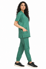 green medical scrub uniform side view highlighting accessible pocket design